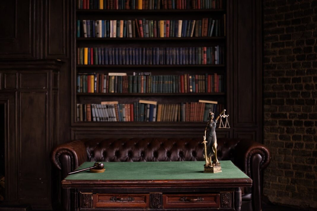 https://www.pexels.com/photo/justice-figurine-on-table-6077091/