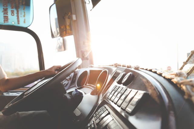 https://www.pexels.com/photo/person-hand-on-steering-wheel-977213/