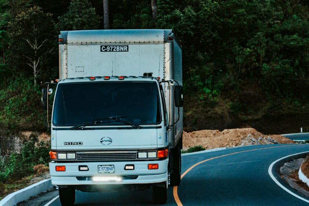 Photo by Oliver Boese: https://www.pexels.com/photo/buss-and-cars-on-city-street-bus-display-word-sorry-4774659/